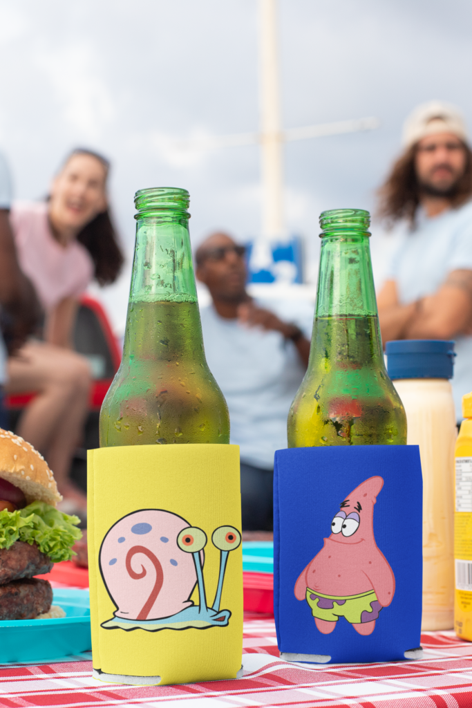 mockup-of-two-beers-in-koozies-at-a-tailgate-party-29896